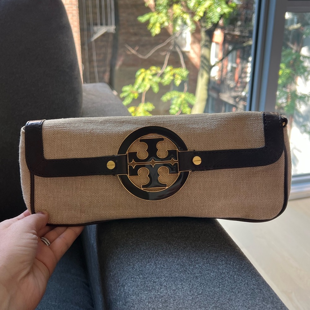 Tory Burch clutch in tan with brown leather trim and gold accents